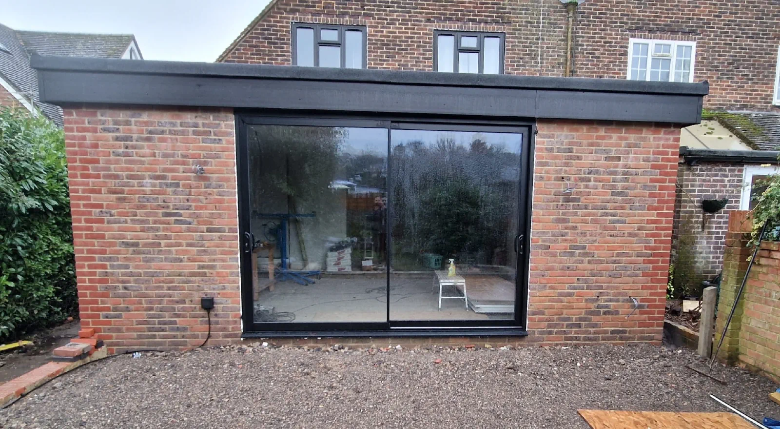 Sliding doors fitted across the rear kitchen and dining extension